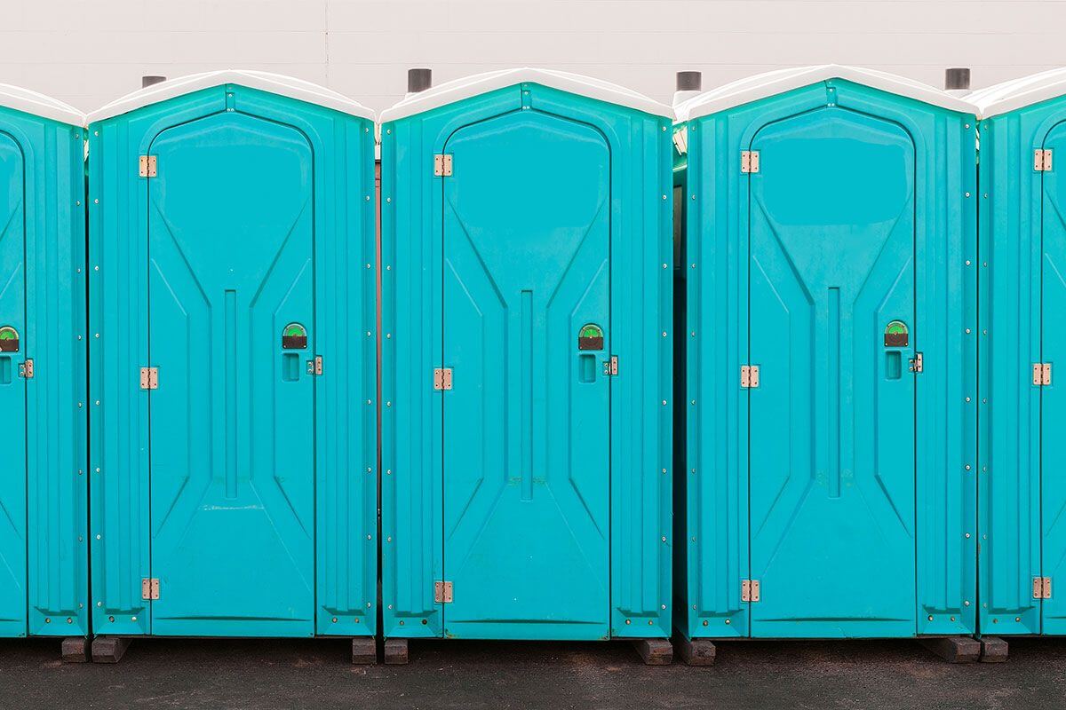 Industrial portable restroom units at a plant in Augusta, Maine